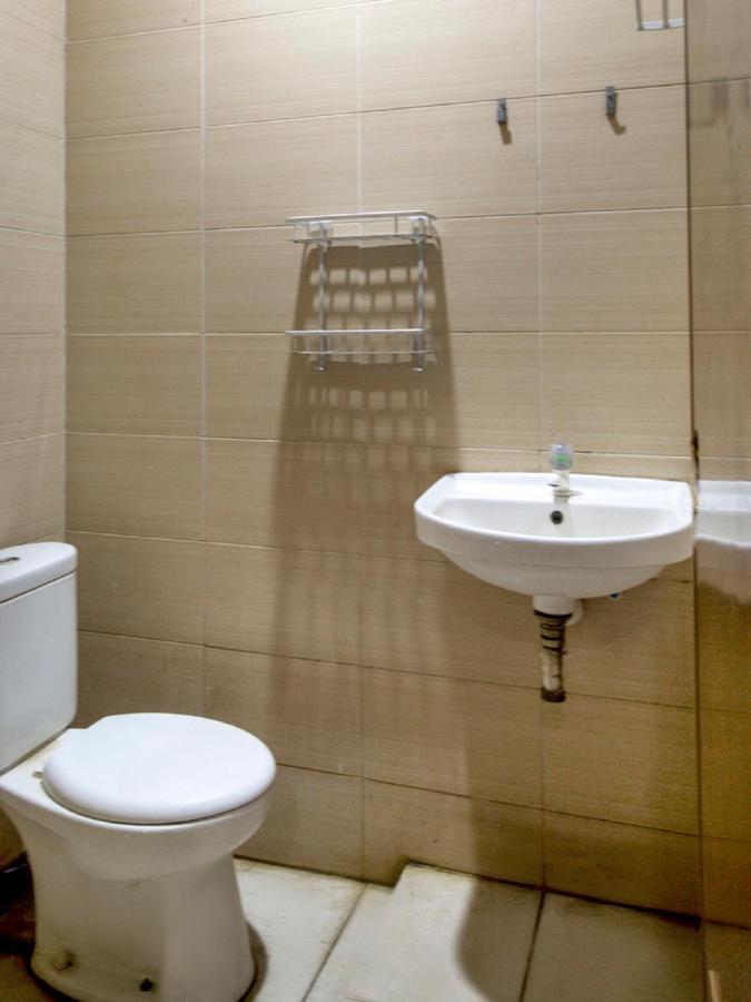 Oyo 3754 Prosperity Mansion Hotel Джакарта Екстериор снимка